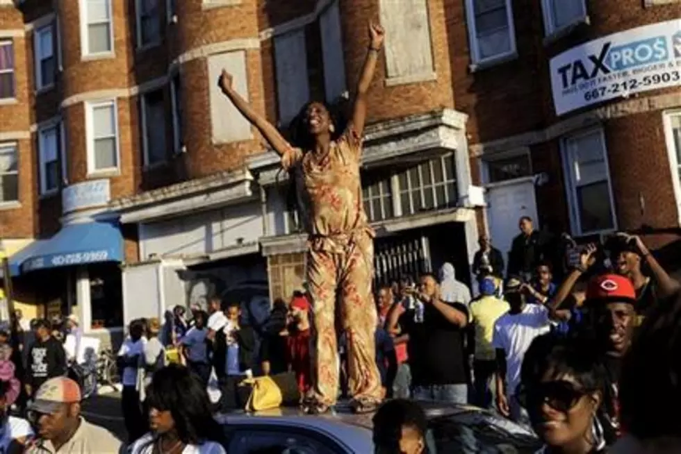 Peaceful Baltimore demonstrators praise top prosecutor