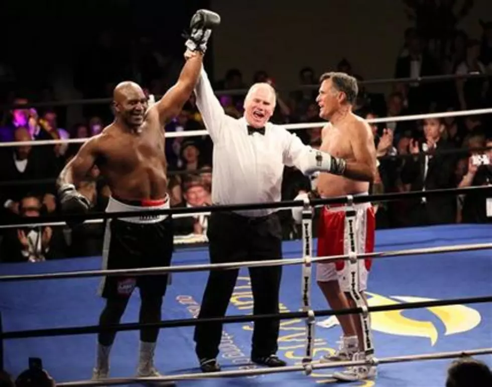 &#8216;Sting like a butterfly&#8217; &#8211; Holyfield jabs Romney for charity