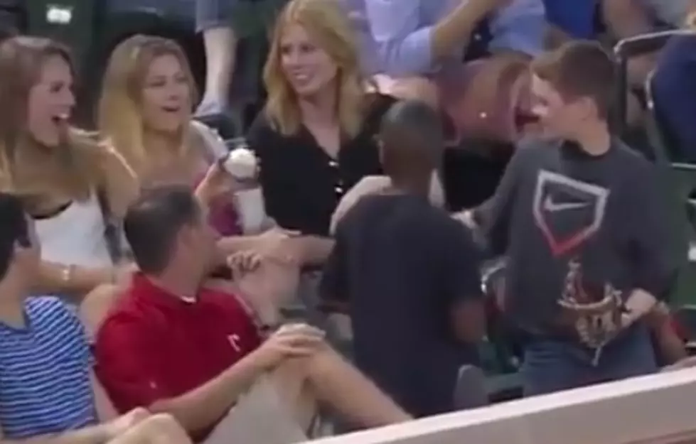 Kid hits on woman twice his age with hidden ball trick