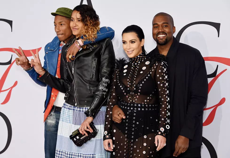 Kim Kardashian says dress caught fire; Pharrell rescued her