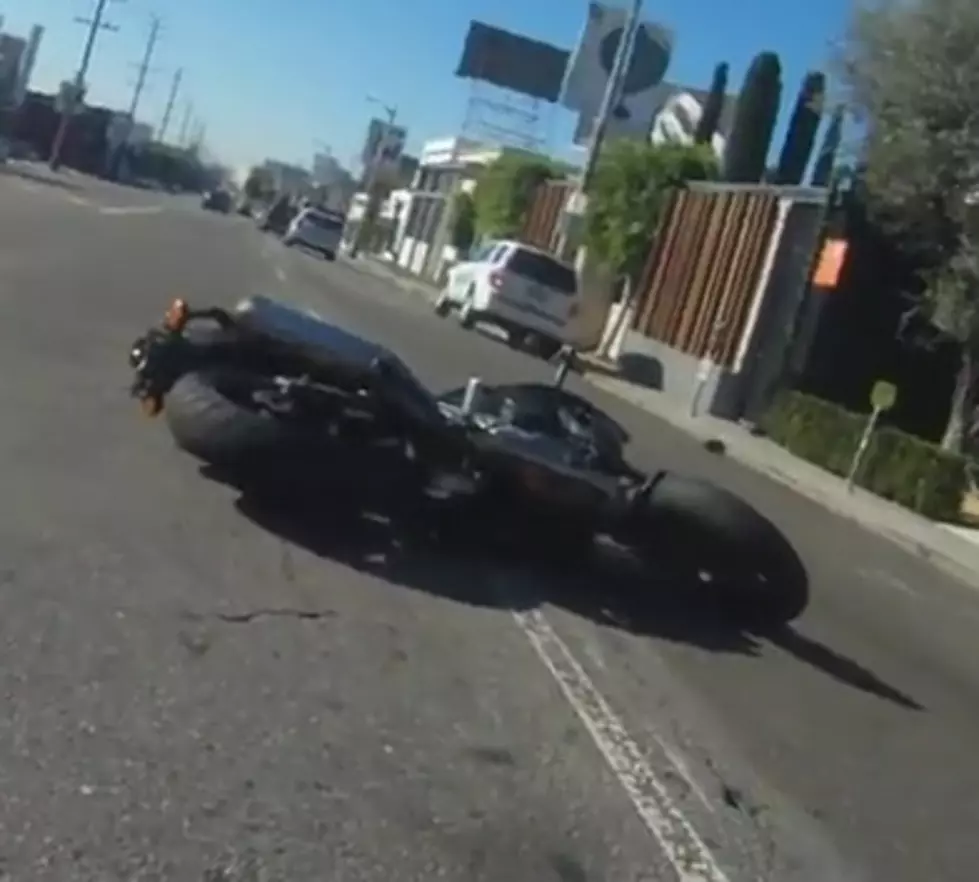 Driver runs into motorcyclist after being called out for texting while driving