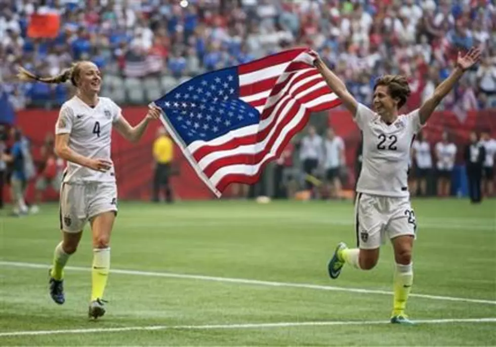 Big win, big flag &#8211; 450-pound banner honors World Cup champs