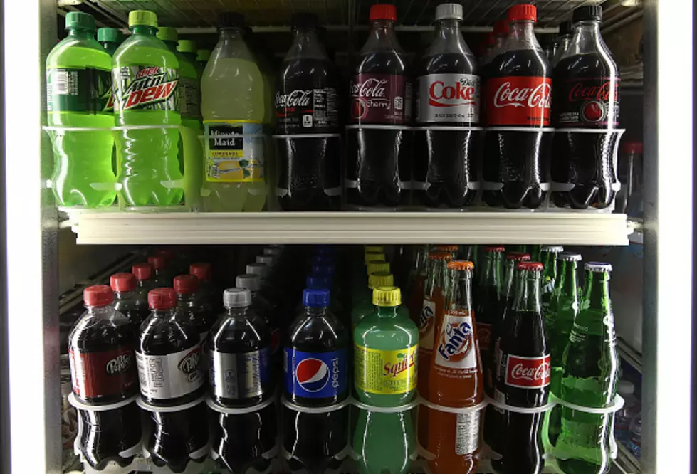 Beverage group sues city over soda warnings, advertising ban