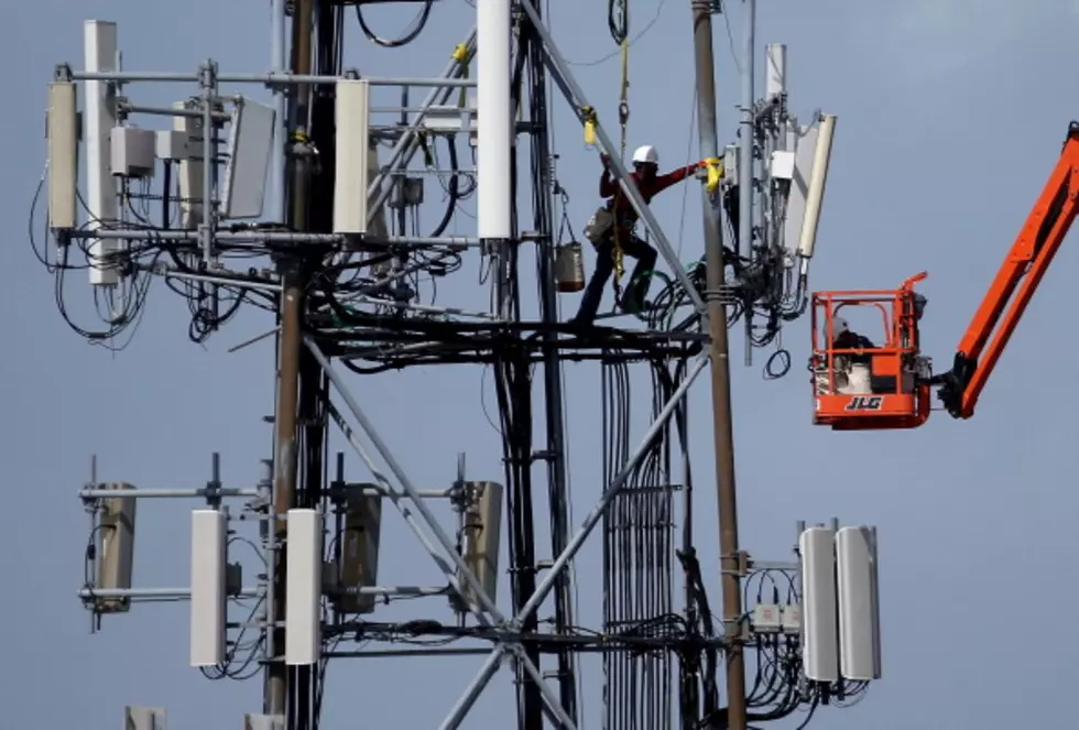 Man tried to steal items from cell phone tower say police