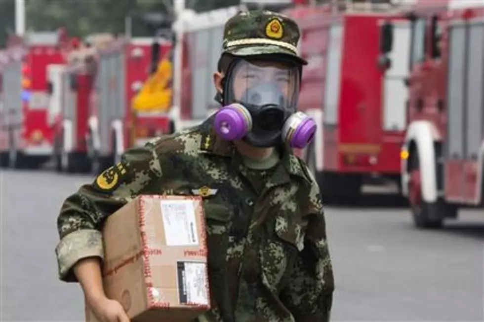 China blast zone blocked over contamination fear; 112 dead