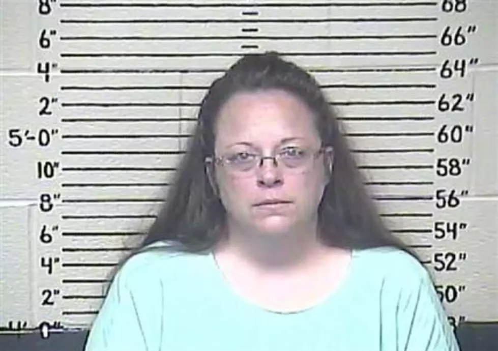 Gay couples will try to wed as defiant Kentucky clerk sits in jail