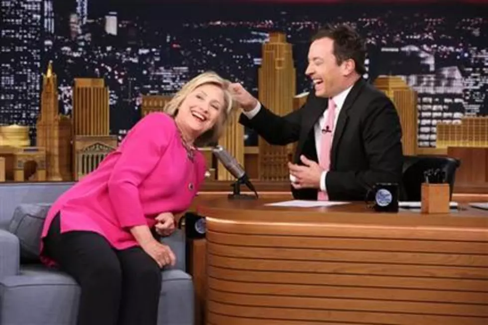 Trump test: Clinton lets Jimmy Fallon tug on her hair