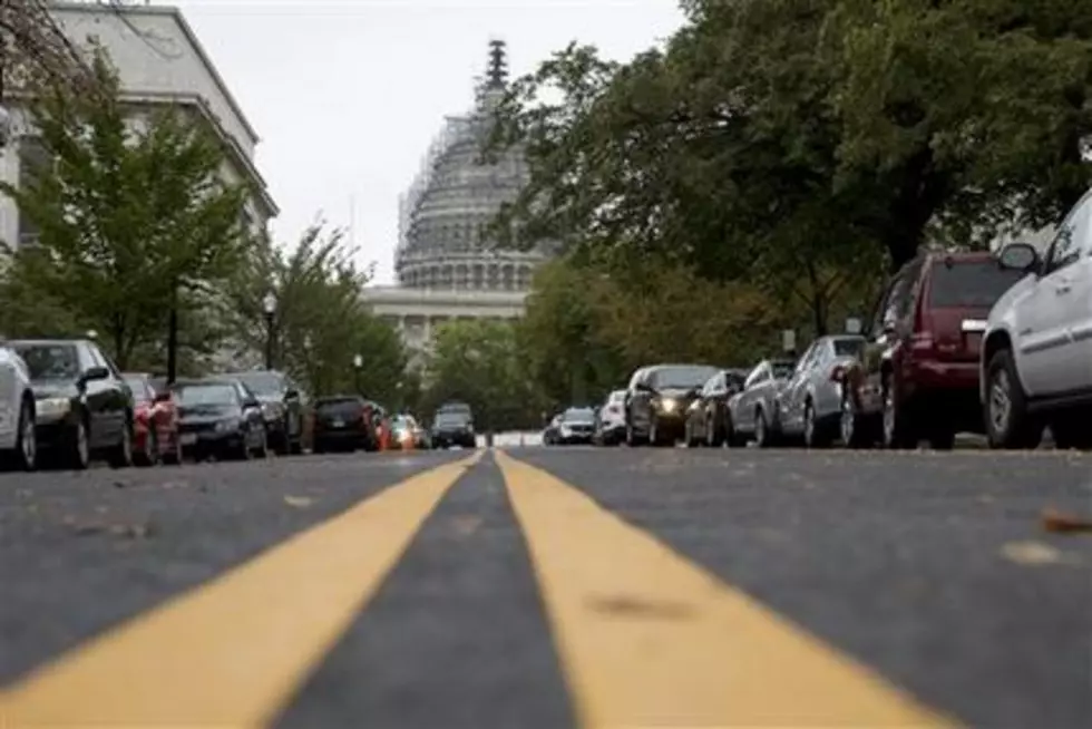 Obama signs stopgap spending bill that averts shutdown