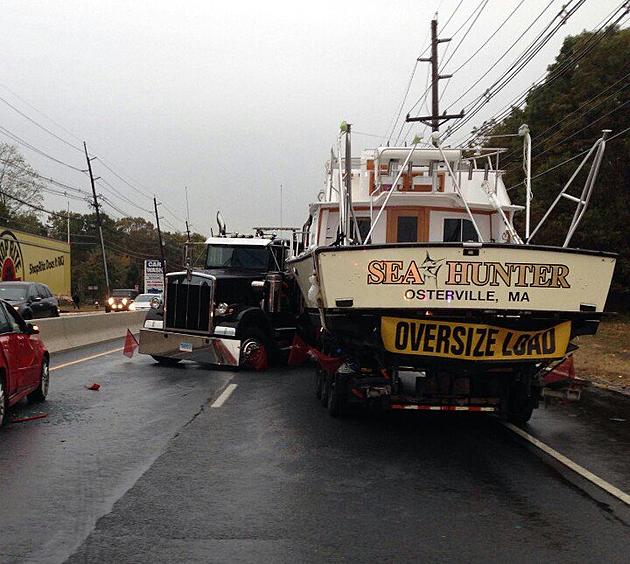 Route 1 closed by jackknifed truck carrying boat