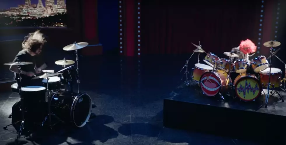 Foo Fighters’ Dave Grohl battles Animal in an epic drum off