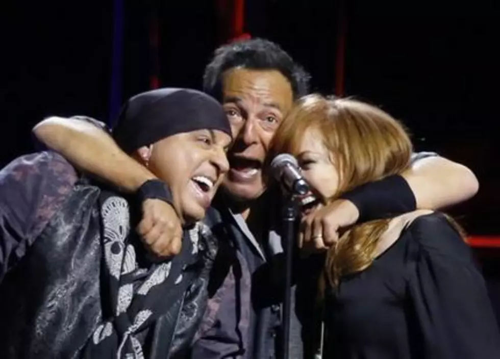 Bruce Springsteen, center, performs with Patti Scialfa, right, and Stevie Van Zandt and the rest of the East Street Band in the first stop of his River Tour in Pittsburgh