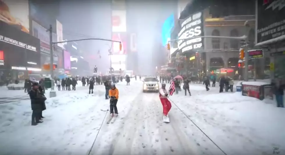 Snowboarder takes insane video on trip through NYC