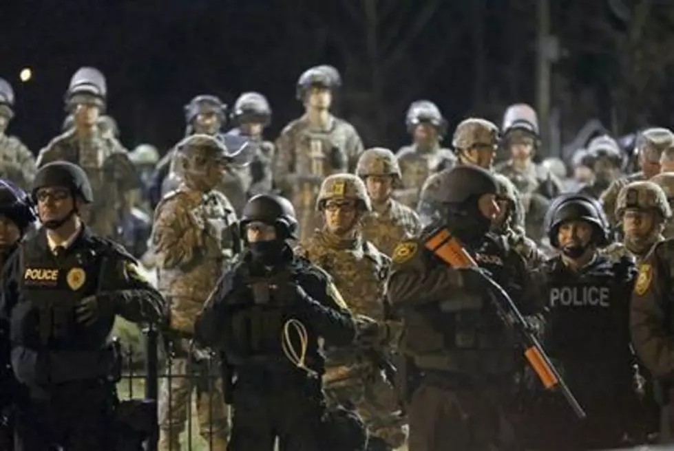 Ferguson police agree to overhaul policies, training