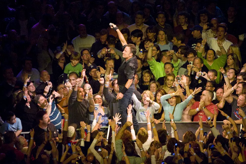Bruce brings up fan to play with the band (Watch)