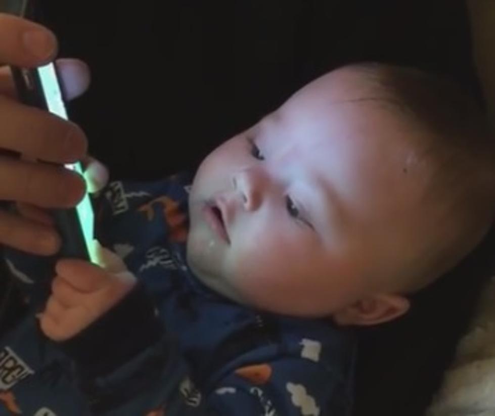 Jeff Deminski’s baby steals his smartphone (Video)