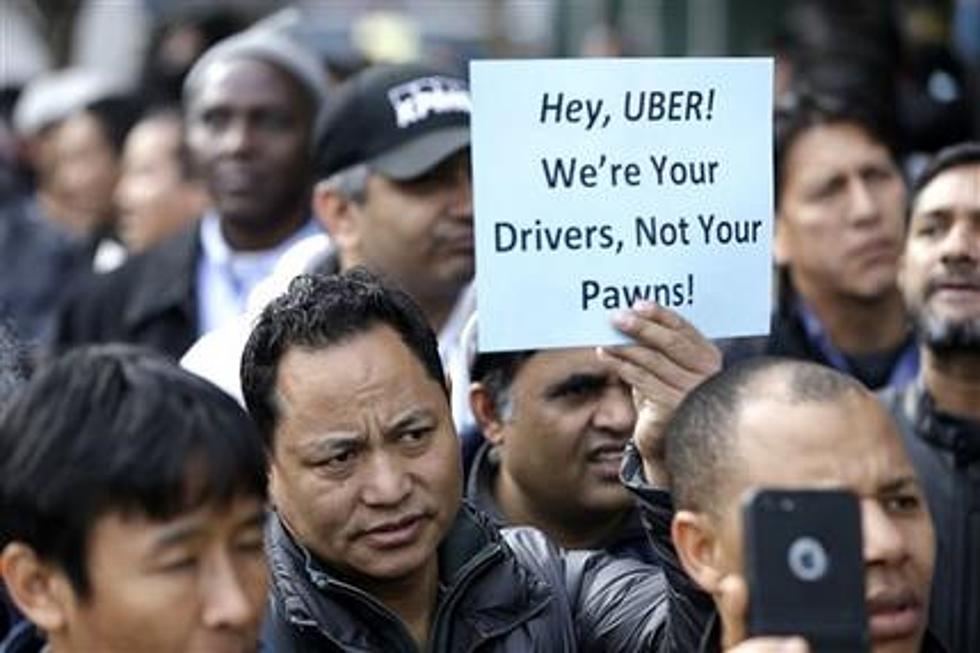 Uber drivers in NYC protest company&#8217;s fare cut