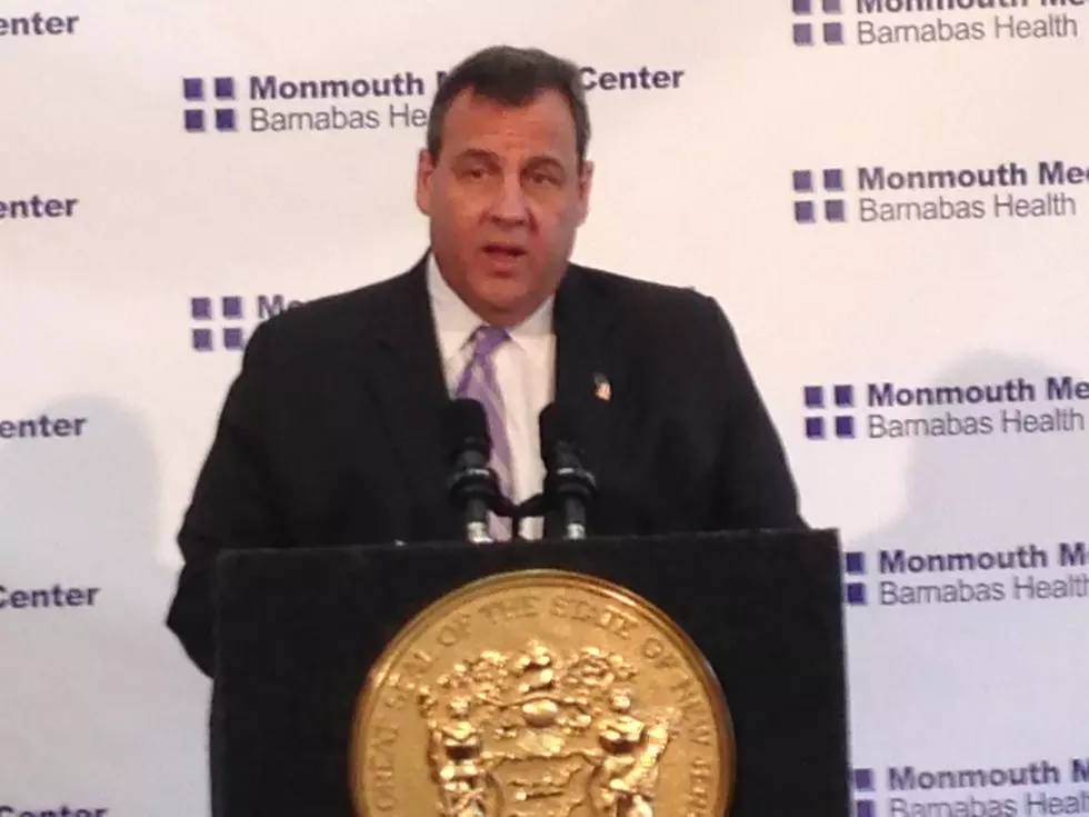 Christie signs $34.5B budget, cutting $300M from programs