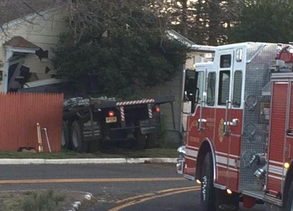 Flatbed truck crashes into Maple Shade home