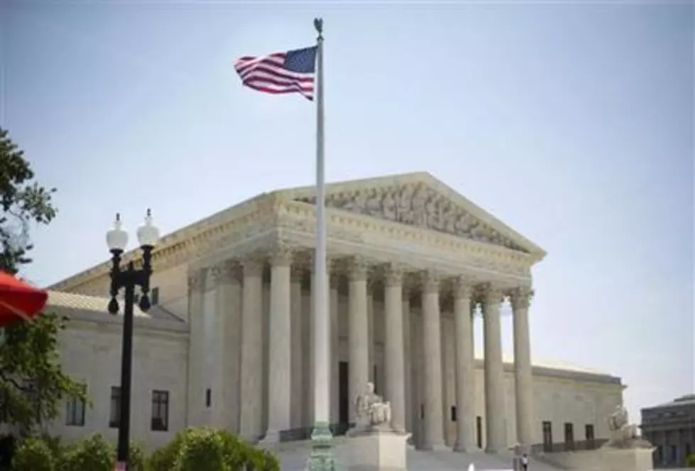 Justices hear dispute over Obama immigration actions