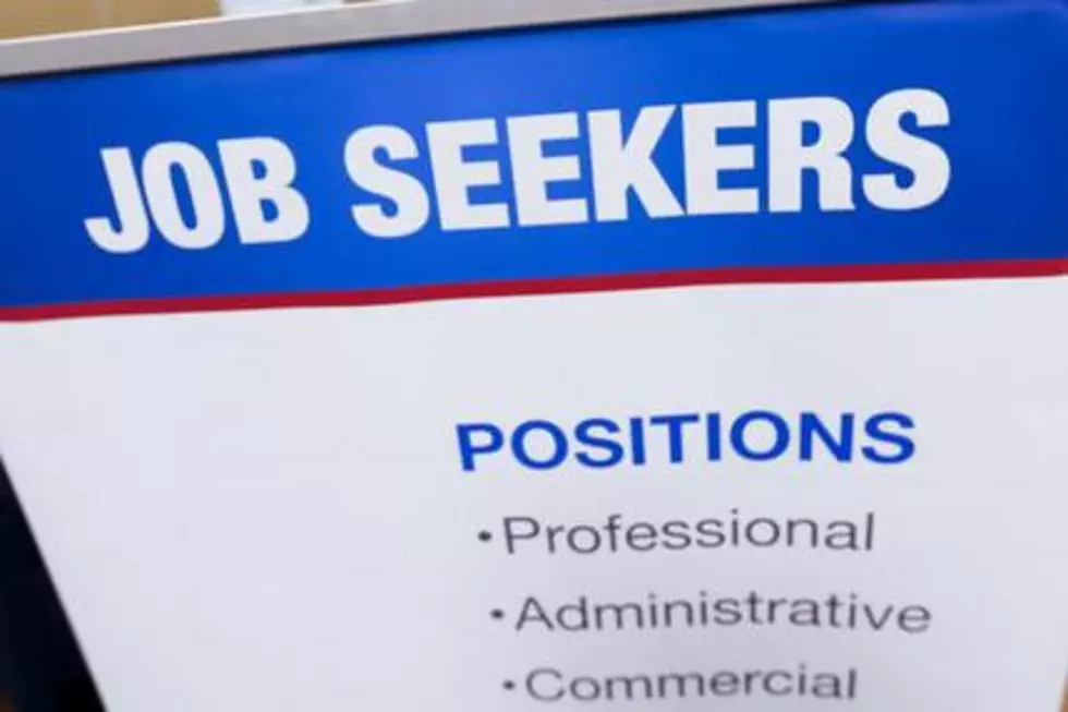 US hiring reaches 9-year high; job openings slip
