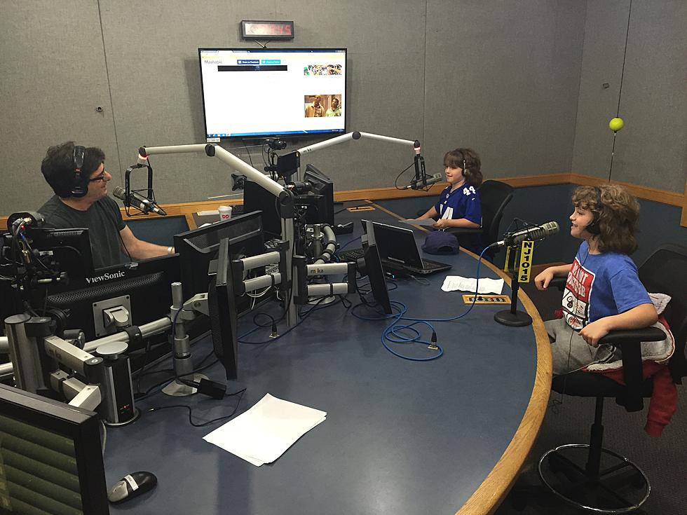 Steve Trevelise introduces two special guests for Take Your Child to Work Day