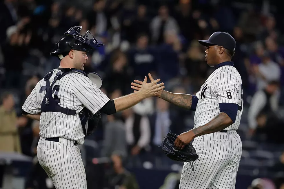 Chapman gets 1st Yankees save as NY overcomes Cain&#8217;s 3 HRs