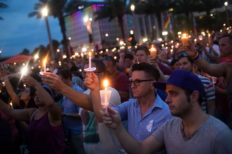 Orlando mourns as possible motives emerge for club gunman