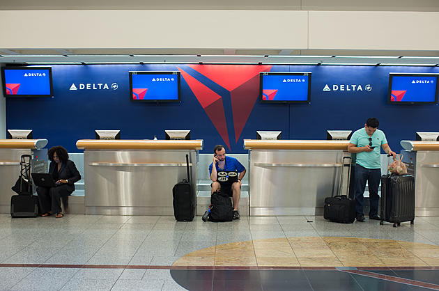 Delta cancels more flights in wake of computer-system outage