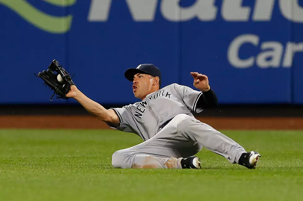 After trading stars, Yanks rally past Mets 6-5 in 10