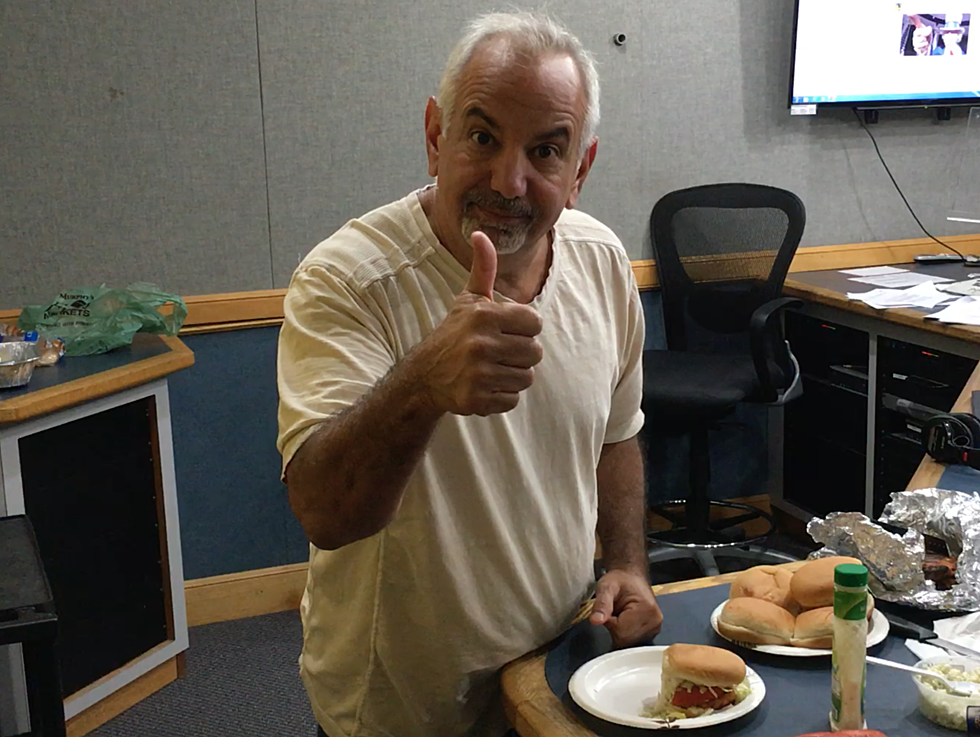Dennis Malloy makes Buffalo Chicken burgers for the crew