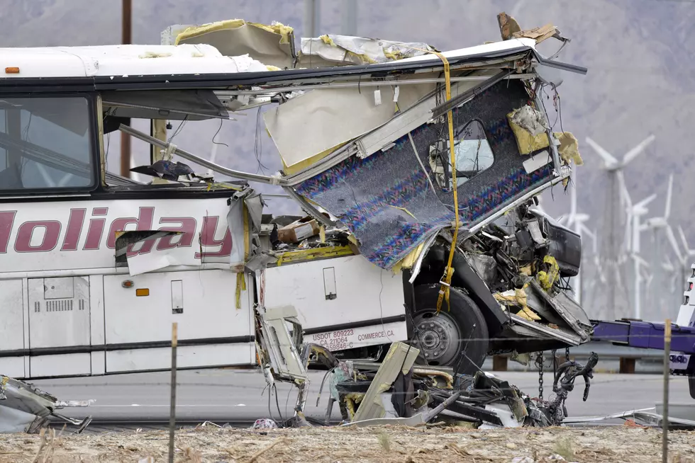 Tour bus slams into truck on slowed-down highway, killing 13