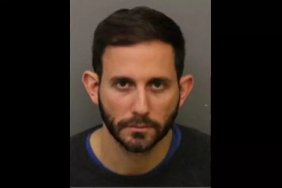 NJ teacher and coach charged with raping teen boys