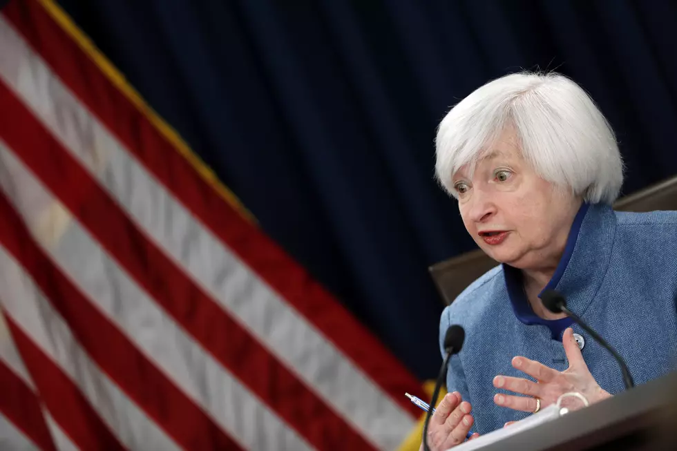 Fed raises key interest rate and foresees 3 hikes in 2017