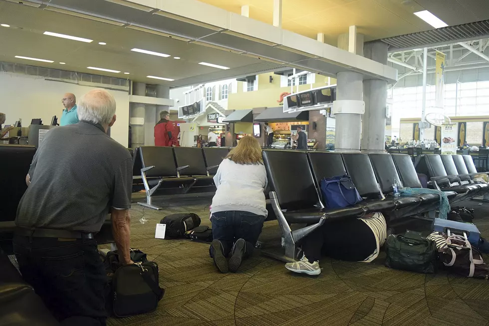 Airport gunman sent panicked passengers fleeing for lives