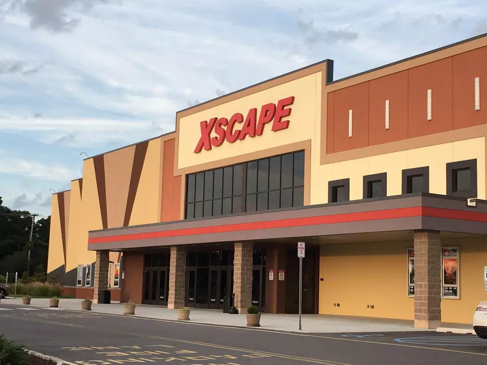  NJ man says he can't escape movie theater's booming noise