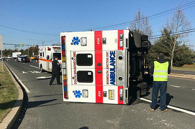 Car runs red light and causes ambulance to roll over in South Brunswick