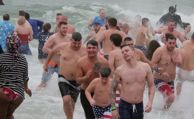 Check Out 7,000+ Polar Bear Plungers Jumping in The Atlantic Ocean on Saturday