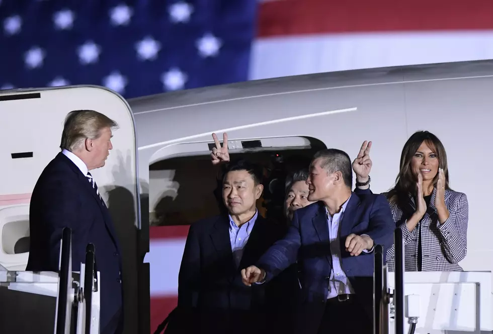 Trump gives freed Americans flag-waving, wee-hours welcome
