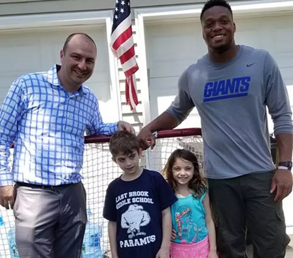 Giants greet school bus survivor at home after 12 days in hospital