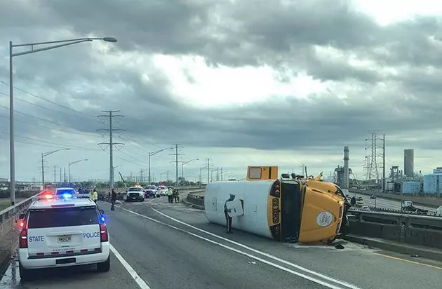 Minor injures after school bus with kids overturns on Turnpike