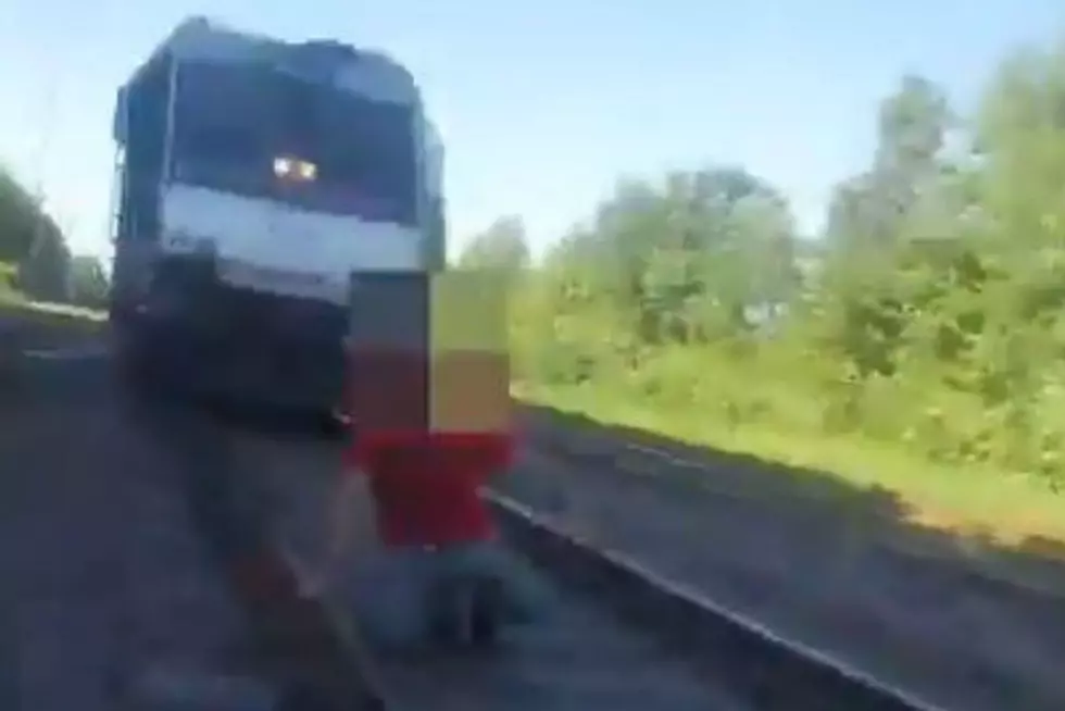 Perth Amboy cop's rescue of man on train tracks is breathtaking
