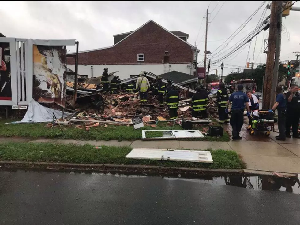 House collapses in Hamilton with people trapped inside