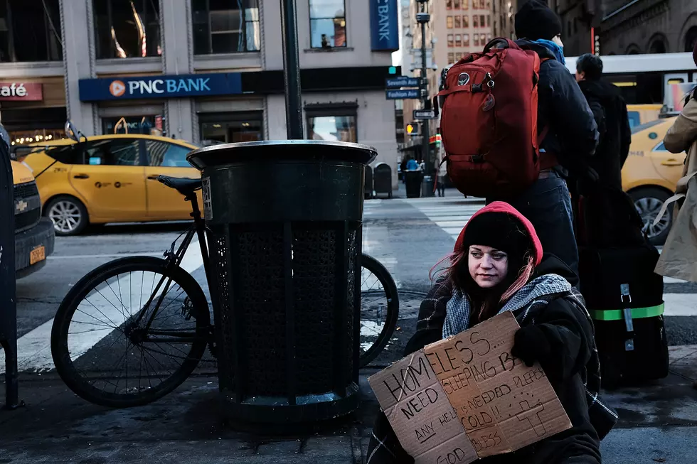 Family sleeping in garbage — homelessness from the street level