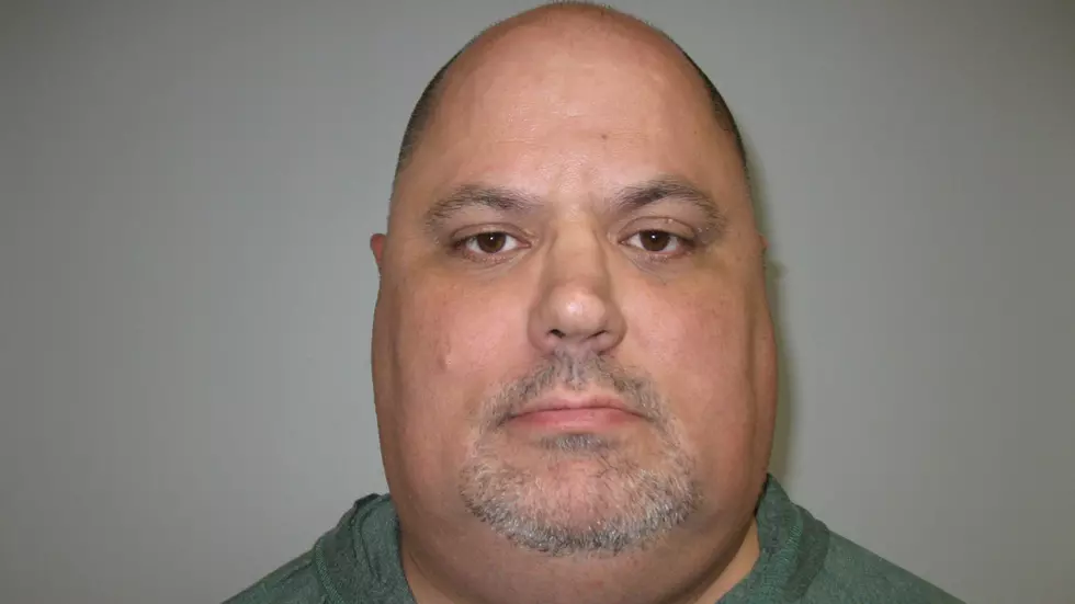 NJ businessman charged with molesting child at T-shirt shop