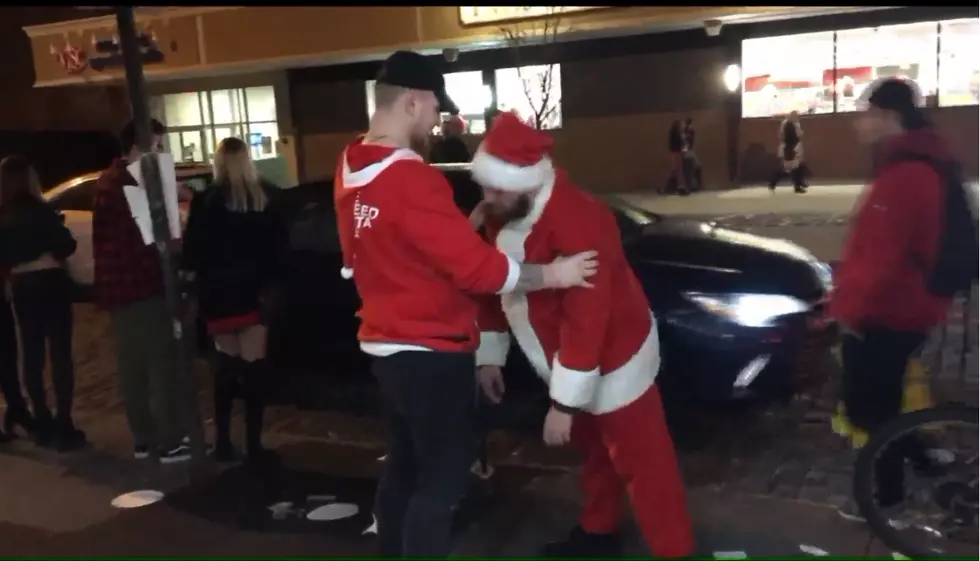 Two officers injured, 14 arrested during annual Hoboken SantaCon