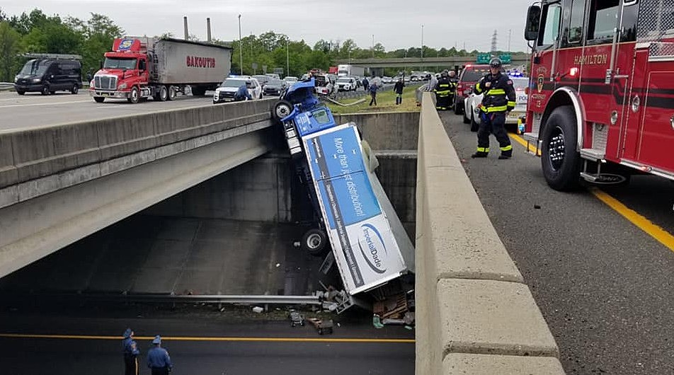 truck falls off overpass