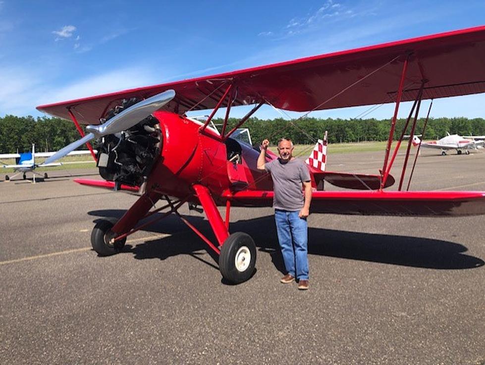 Watch my ride in a 1942 open cockpit biplane