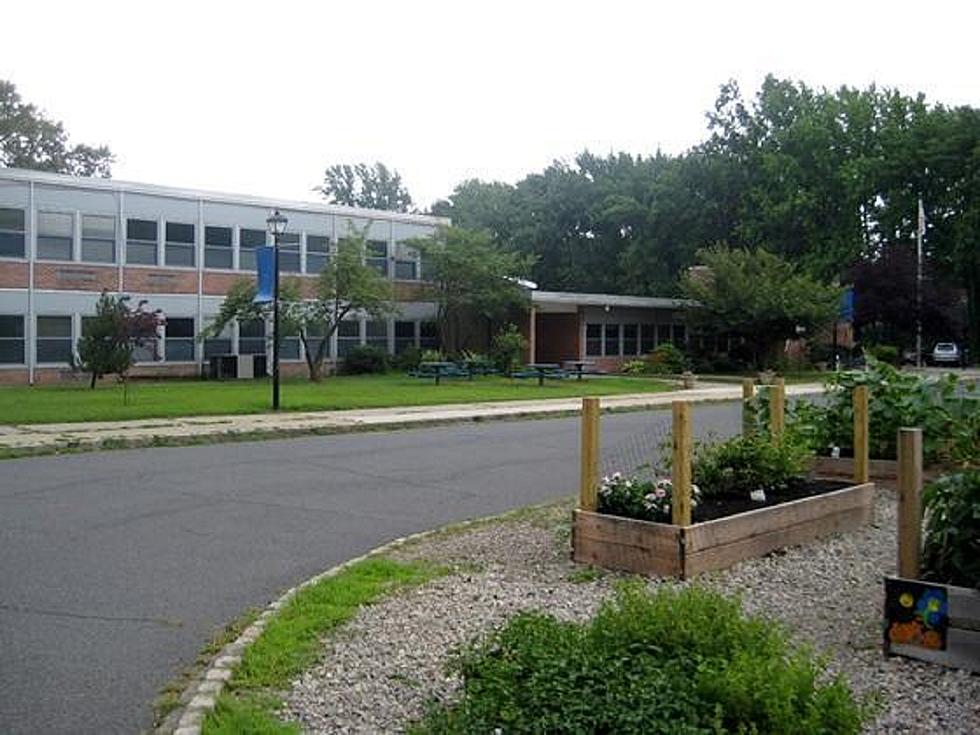 Man arrested at NJ school with loaded gun and 130+ rounds