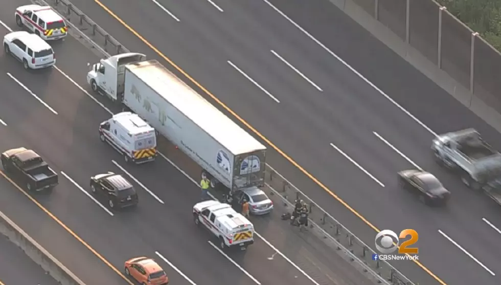 Truck rear ended by a car on the northbound Turnpike near Route 18