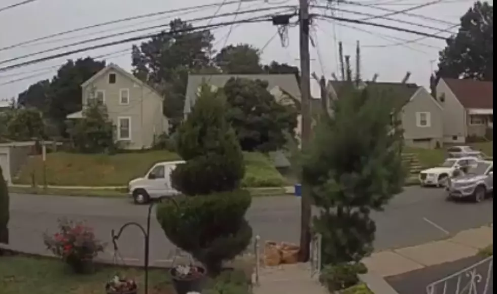 NJ man hangs onto stolen SUV for nearly a mile — VIDEO